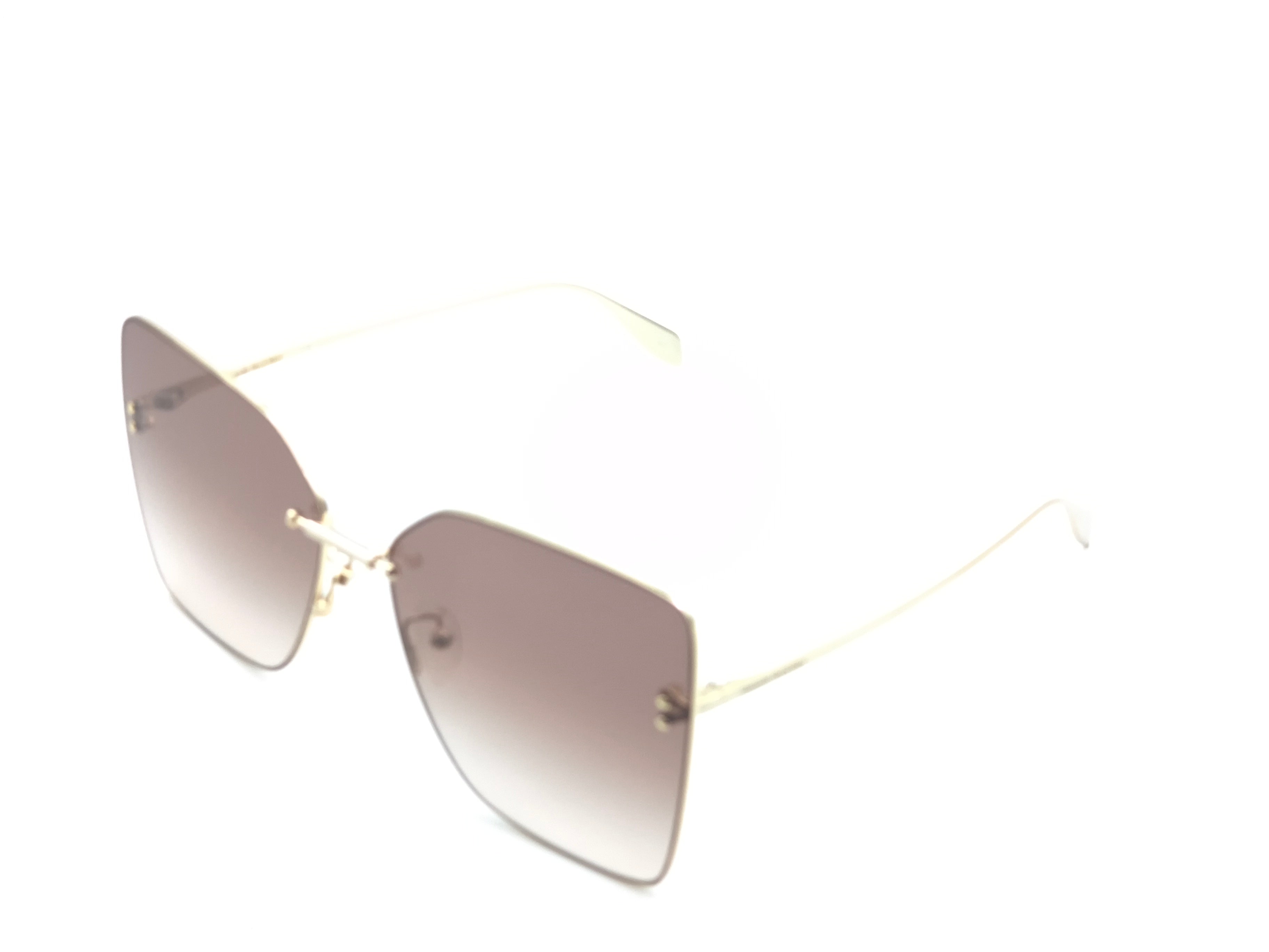 Okulary przeciwsłoneczne Alexander McQUEEN AM0342S  002 zarysowane