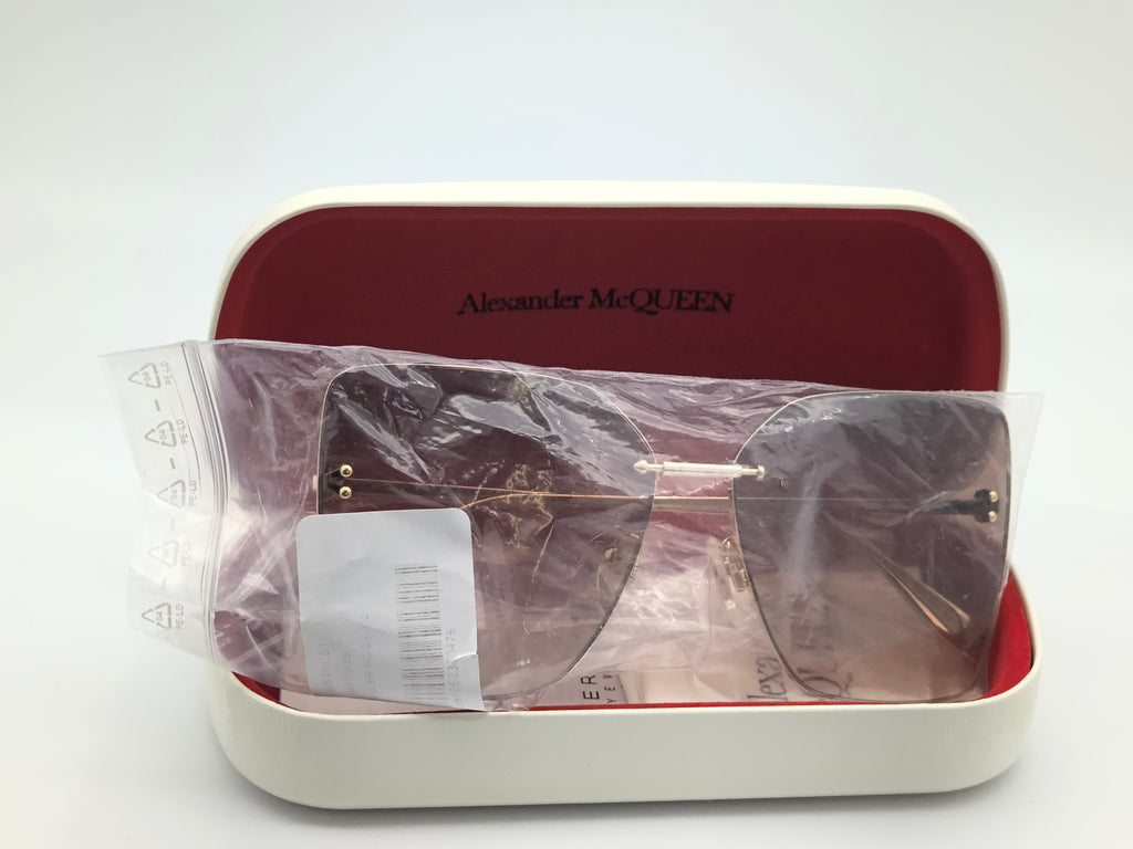 Okulary przeciwsłoneczne Alexander McQUEEN AM0342S  002 zarysowane